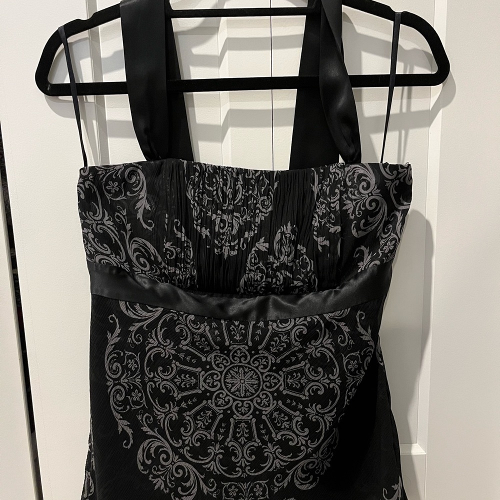 Super cuter black and grey top, can be dressed up or down